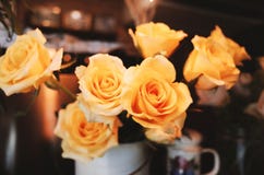 Roses on table in vase retro style royalty free stock photo Roses on table in vase retro style royalty free stock photo
