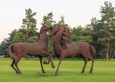 ROSTOV-ON-DON, RUSSIA - JUNE 18, 2016: Sculpture of the iron horses in the park of the city Rostov near airport stock photo ROSTOV-ON-DON, RUSSIA - JUNE 18, 2016: Sculpture of the iron horses in the park of the city Rostov near airport stock photo