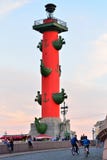 Rostral column and walking tourists on the descent the spit of V royalty free stock photo Rostral column and walking tourists on the descent the spit of V royalty free stock photo