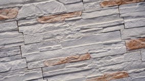 Roteer van decoratieve steen Beweging omhoog het graniet aan het huis Muur van Steen stock footage Roteer van decoratieve steen Beweging omhoog het graniet aan het huis Muur van Steen stock footage