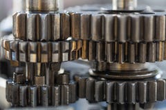 Roues de vitesse de moteur, fond industriel, image stock Roues de vitesse de moteur, fond industriel, image stock