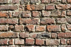 Rough Red Bricks And Mortar Stock Photo