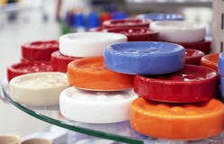 Round ceramic soap dishes of bright colors stock image Round ceramic soap dishes of bright colors stock image