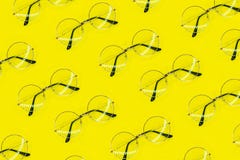 Round glasses pattern on yellow background. Fashion minimal summer pattern. Flat lay royalty free stock images Round glasses pattern on yellow background. Fashion minimal summer pattern. Flat lay royalty free stock images