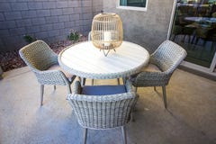 Round Wicker Patio Table With Chairs royalty free stock photography Round Wicker Patio Table With Chairs royalty free stock photography