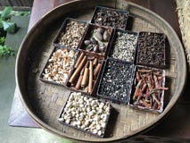 Round wooden box with different spices and ingredients royalty free stock image Round wooden box with different spices and ingredients royalty free stock image
