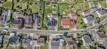 row of houses on a street in Germany, detached houses with gardens, aerial photo stock photography row of houses on a street in Germany, detached houses with gardens, aerial photo stock photography
