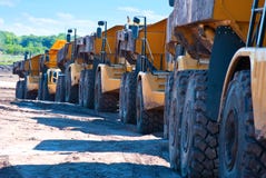 Row Of Dump Trucks Stock Images Row Of Dump Trucks Stock Images