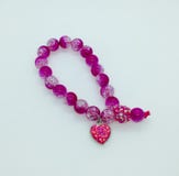 Roze armband met hart stock foto's Roze armband met hart stock foto's