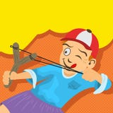 Rude boy is trying to hit something with his sling Royalty Free Stock Photo Rude boy is trying to hit something with his sling Royalty Free Stock Photo