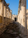 Ruins of Appollo temple with fortress at back in ancient Corinth, Peloponnese, Greece stock images Ruins of Appollo temple with fortress at back in ancient Corinth, Peloponnese, Greece stock images