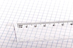 old paper ruler and rope on wooden table stock image