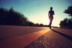 Runner athlete running at seaside road Royalty Free Stock Photography Runner athlete running at seaside road Royalty Free Stock Photography