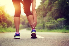 Runner Hold Her Sports Injured Leg Stock Images Runner Hold Her Sports Injured Leg Stock Images