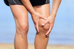 Runner Injury - Man Running With Knee Pain Royalty Free Stock Photography Runner Injury - Man Running With Knee Pain Royalty Free Stock Photography