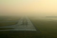 Runway In The Fog Royalty Free Stock Photos