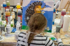 Russia, Tatarstan, April 20, 2019. The Girl Draws A Hedgehog. Creative Teen Girl Paitning A Picture On Easel. Interior Of The Art Stock Photo