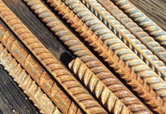 Rusted Rebar on a Wooden Workbench royalty free stock image Rusted Rebar on a Wooden Workbench royalty free stock image