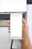Ręka biznesmen trzyma pustego smartphone fotografia stock Ręka biznesmen trzyma pustego smartphone fotografia stock