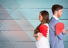 Sad couple holding broken heart Royalty Free Stock Photos Sad couple holding broken heart Royalty Free Stock Photos