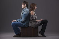 Sad Couple With Suitcase Stock Photography