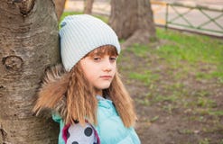 Sad girl in the park Stock Photo Sad girl in the park Stock Photo