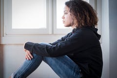 Alone and lonely young girl feeling depressed Stock Photography Alone and lonely young girl feeling depressed Stock Photography