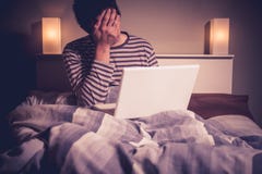 Sad Man In Bed With Laptop Stock Photos Sad Man In Bed With Laptop Stock Photos