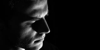Sad man profile, Dark guy male in depression, black and white, serious look