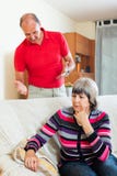Sad mature woman listening to angry man royalty free stock photos Sad mature woman listening to angry man royalty free stock photos