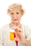 Sad Senior Woman With Pills Stock Image