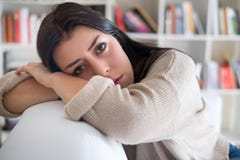 Close up portrait of sad depressed young woman at home stock images Close up portrait of sad depressed young woman at home stock images