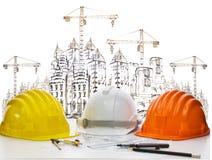 Safety helmet on engineer working table against sketching of building construction and high crane safety helmet on engineer royalty free stock photography Safety helmet on engineer working table against sketching of building construction and high crane safety helmet on engineer royalty free stock photography