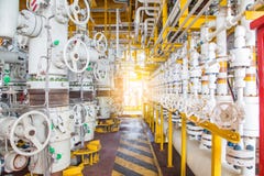 Safety valves on offshore oil and gas wellhead remote platform to protect pipe and flow line system. stock photo Safety valves on offshore oil and gas wellhead remote platform to protect pipe and flow line system. stock photo