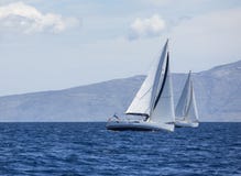Sailing in the wind through the waves at the Aegean Sea in Greece. Luxury yachts. royalty free stock image Sailing in the wind through the waves at the Aegean Sea in Greece. Luxury yachts. royalty free stock image