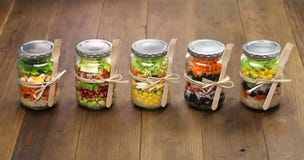 Salad in glass jar stock photo Salad in glass jar stock photo