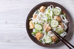 Salad of rice noodles with chicken and cucumbers top view stock photo Salad of rice noodles with chicken and cucumbers top view stock photo