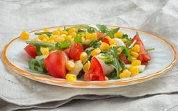Salad With Corn, Tomato, Arugula And Mozzarella Royalty Free Stock Image