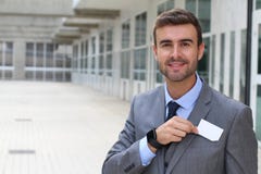 Salesman handing you a business card royalty free stock images Salesman handing you a business card royalty free stock images