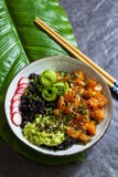 Salmon poke dish with black rice royalty free stock images Salmon poke dish with black rice royalty free stock images