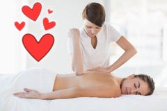 Samengesteld beeld van een massagezitting met liefdeharten vector illustratie Samengesteld beeld van een massagezitting met liefdeharten vector illustratie