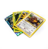 Samling av 4 Pokemon kort som isoleras på en vit bakgrund arkivfoto Samling av 4 Pokemon kort som isoleras på en vit bakgrund arkivfoto