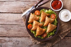 Samosa On A Plate With Sauce, Horizontal Top View Royalty Free Stock Images Samosa On A Plate With Sauce, Horizontal Top View Royalty Free Stock Images