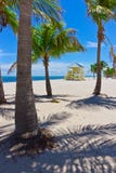Sand Beach With Palm Trees And Lifegard Tower Royalty Free Stock Photo