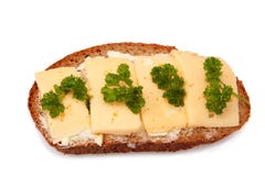 Sandwich Of Whole Bread And Cheese And Greens Royalty Free Stock Photos