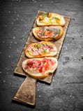 Sandwiches with seafood, meat and vegetables on fresh bread. royalty free stock image Sandwiches with seafood, meat and vegetables on fresh bread. royalty free stock image