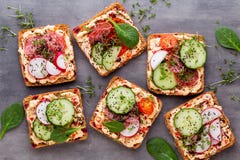 Sandwiches With Cream Cheese, Vegetables And Salami Royalty Free Stock Photo