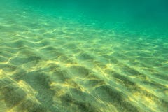 Sandy sea bottom, small sand dunes stock photos Sandy sea bottom, small sand dunes stock photos