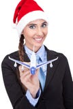 Santa businesswoman holding plane Stock Photos Santa businesswoman holding plane Stock Photos