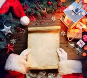 Santa Claus Desk Reading Wish List With Ornament